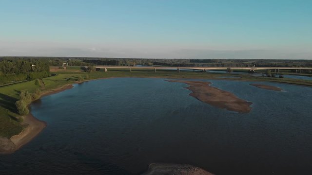 Highwaybridge over a river in farmland