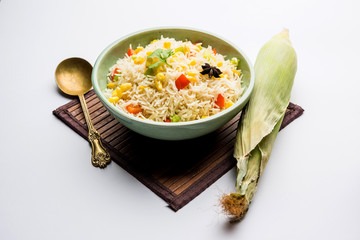 Corn Pilaf or Pulav made using boiled Maize seeds with rice and vegetables. selective focus