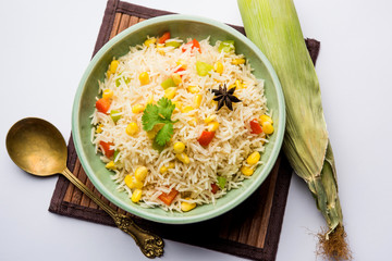 Corn Pilaf or Pulav made using boiled Maize seeds with rice and vegetables. selective focus