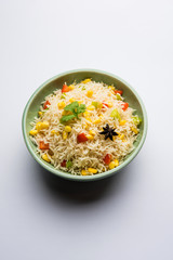 Corn Pilaf or Pulav made using boiled Maize seeds with rice and vegetables. selective focus