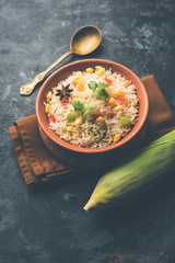 Corn Pilaf or Pulav made using boiled Maize seeds with rice and vegetables. selective focus