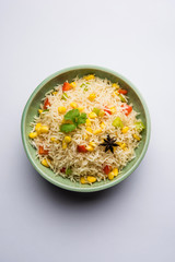 Corn Pilaf or Pulav made using boiled Maize seeds with rice and vegetables. selective focus