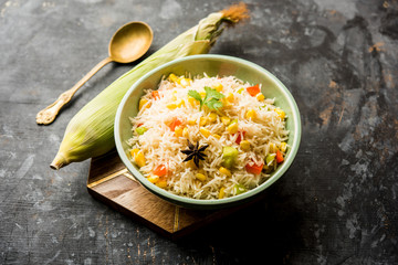 Corn Pilaf or Pulav made using boiled Maize seeds with rice and vegetables. selective focus