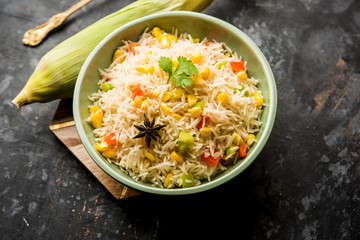Corn Pilaf or Pulav made using boiled Maize seeds with rice and vegetables. selective focus