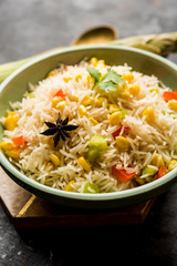 Corn Pilaf or Pulav made using boiled Maize seeds with rice and vegetables. selective focus