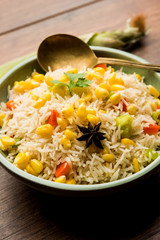 Corn Pilaf or Pulav made using boiled Maize seeds with rice and vegetables. selective focus
