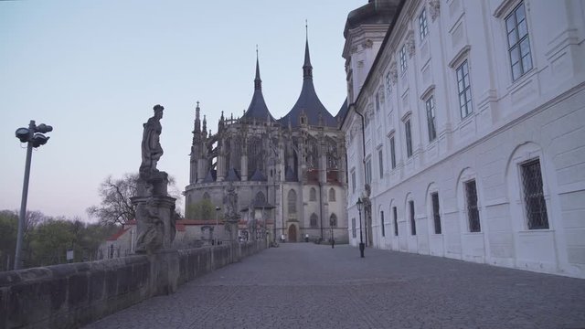 St. Barbara's Cathedral in Kutna Hora, Czech Republic, walking towards it, smooth steady evening shot