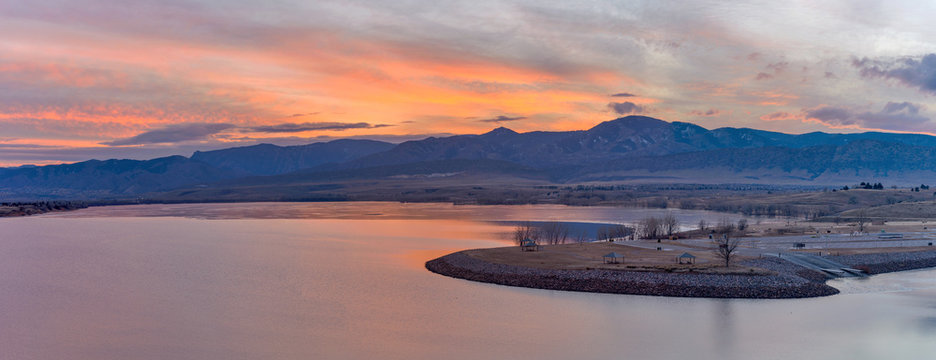 Winter Sunset at Chatfield - A panoramic sunset view of Chatfield Reservoir at the foothill of Front Range of Rocky Mountains. Chatfield State Park, Littleton, Colorado, USA.