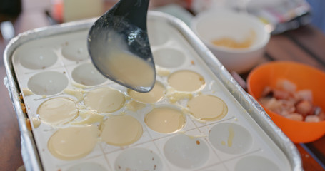 Cook takoyaki at home