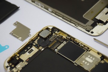 Tools for repairing smart phones on a white background - Change or replacement smart phones battery
