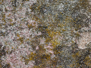 Typical detail of an ancient Italian house wall, made of hand-carved river stones.
