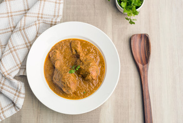 authentic chicken gravy served in a plate for lunch
