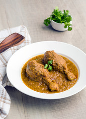 authentic chicken gravy served in a plate for lunch