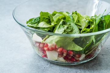 Pomegeranate and Pear Salad in Glass Bowl Ready to Make.