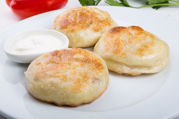 Fried buns stuffed with meat