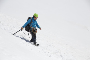 Fototapeta na wymiar alpinism in the snowy mountains