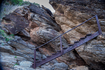 Wooden stairs along the rocks