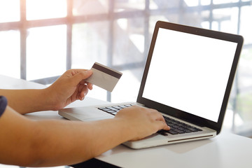 Credit card payment, buy and sell products & service and using shopping. By Business women with lab top computer.