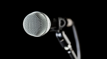 Singer in karaokes, microphones. Live music, audio equipment. Closeup microphone, macro mic,...