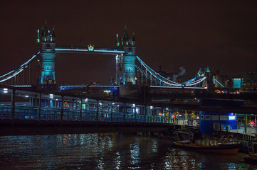 Fototapeta na wymiar London river thames at night with calm water and tower bridge