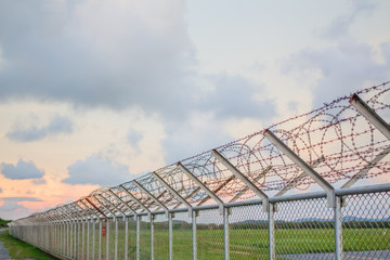 wire mesh steel with green grass background in Phuket Thailand