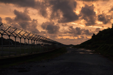 Background Net Wall ,mesh steel  of war in prisons, barbed wire dark, Phuket Thailand
