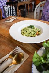 Spaghetti with homemade pesto sauce,food concept.
