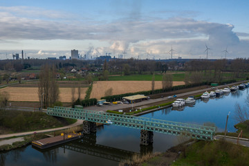 Fototapeta na wymiar Aerial view of the Spanjeveerbrug, a bailey bridge over the Moervaart canal, in Mendonk, Belgium