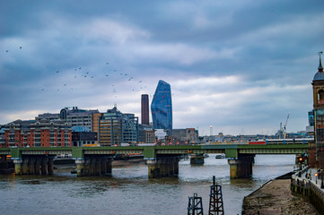 The south bank buildings in london with bridge on the water