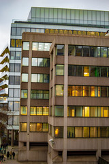 The yellow building with lights in london with lights