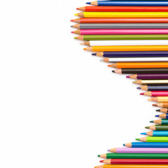 Colour pencils isolated on white background. Back to school concept Wood texture pencil with sharpening shavings on white background pencil on table, the blogger instrument. copyspace, space for text.