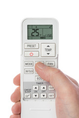Remote control from air conditioner in hand