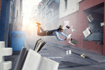 Smiling joyful levitating young man. Mixed media