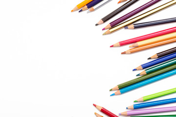 Colour pencils isolated on white background. Back to school concept Wood texture pencil with sharpening shavings on white background pencil on table, the blogger instrument. copyspace, space for text.