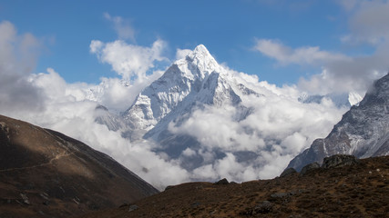 Ama dablam is a mountain in the Himalaya range of eastern Nepal. The main peak is 6,812 metres.Ama dablam is one of the most beautiful mountain in the World as the “Matterhorn of the Himalaya”