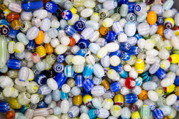 Multicolored handmade beads. Colorful background of the bead. Fashionable craft of women....