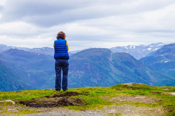 Tourist enjoy mountains view, Norway