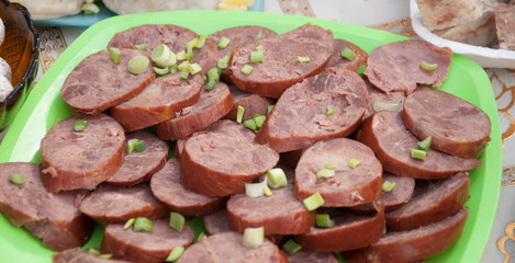 sliced pork sausage on plate