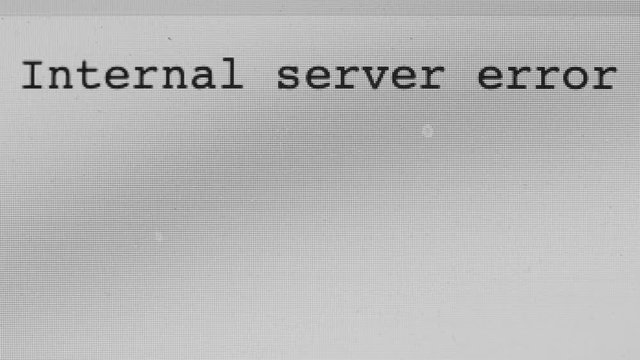 A computer screen shows internal server error