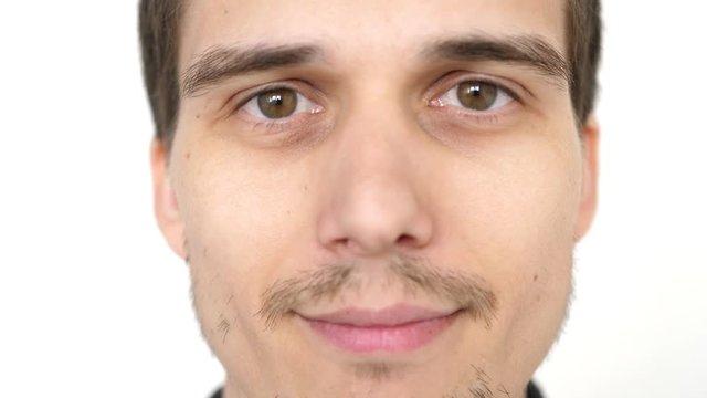 portrait of young attractive successful smiling man on a white background. slow motion. 3840x2160