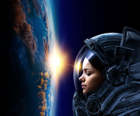 Astronaut and planet, human in space concept