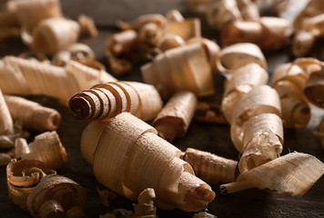Curled wood shavings on table, closeup