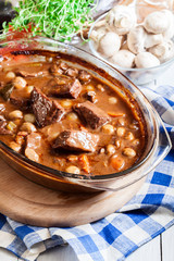 Beef Bourguignon stew in a casserole dish