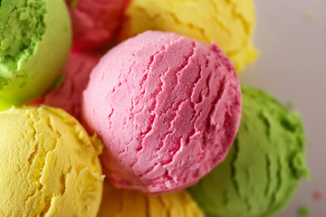 Balls of colorful tasty ice cream, closeup