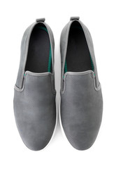 Pair of stylish casual shoes on white background