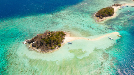 Tropical islands with white beaches. Turquoise lagoon and coral reefs, top view. Philippines, Palawan