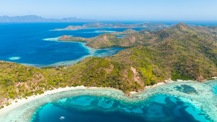 Blue sea and many islands.Ridge of islands in the ocean aerial view. Philippines, Palawan