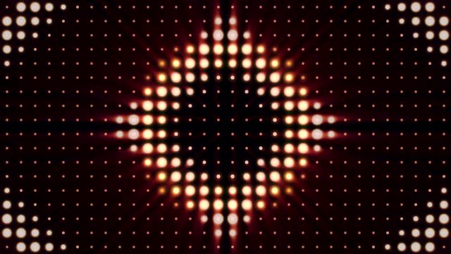 Abstract colorful background with shining spotlights in forms of circle and rhombus, concert lighting. Animation. Blinking yellow, red, and white soffits, seamless loop.