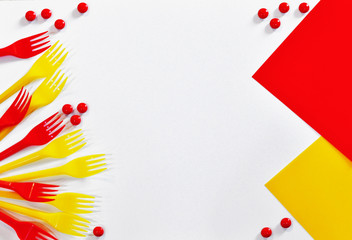 Colored background of red and yellow forks