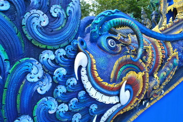 Close-up blue dragon statue at the temple.
